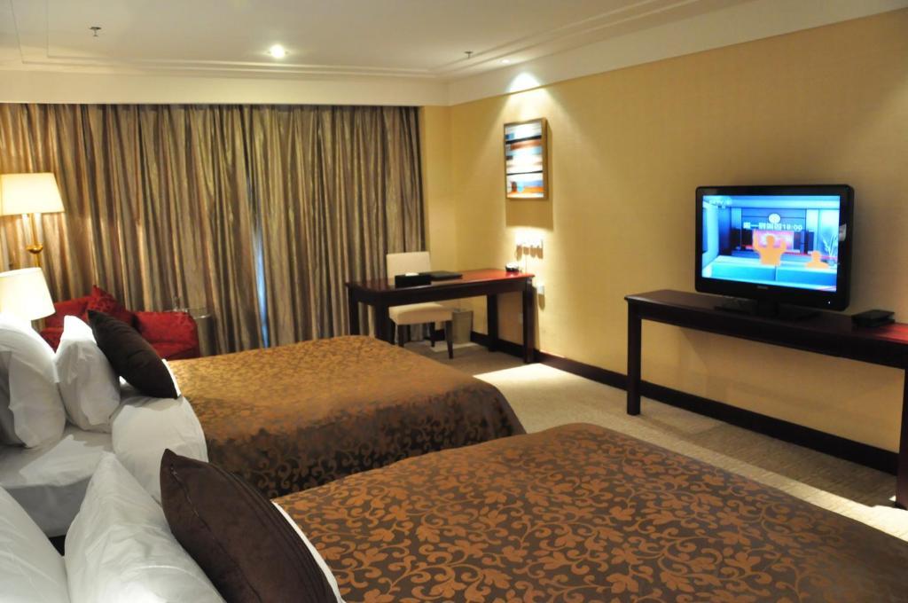New Cozy Harbour Hotel Nanning Zimmer foto